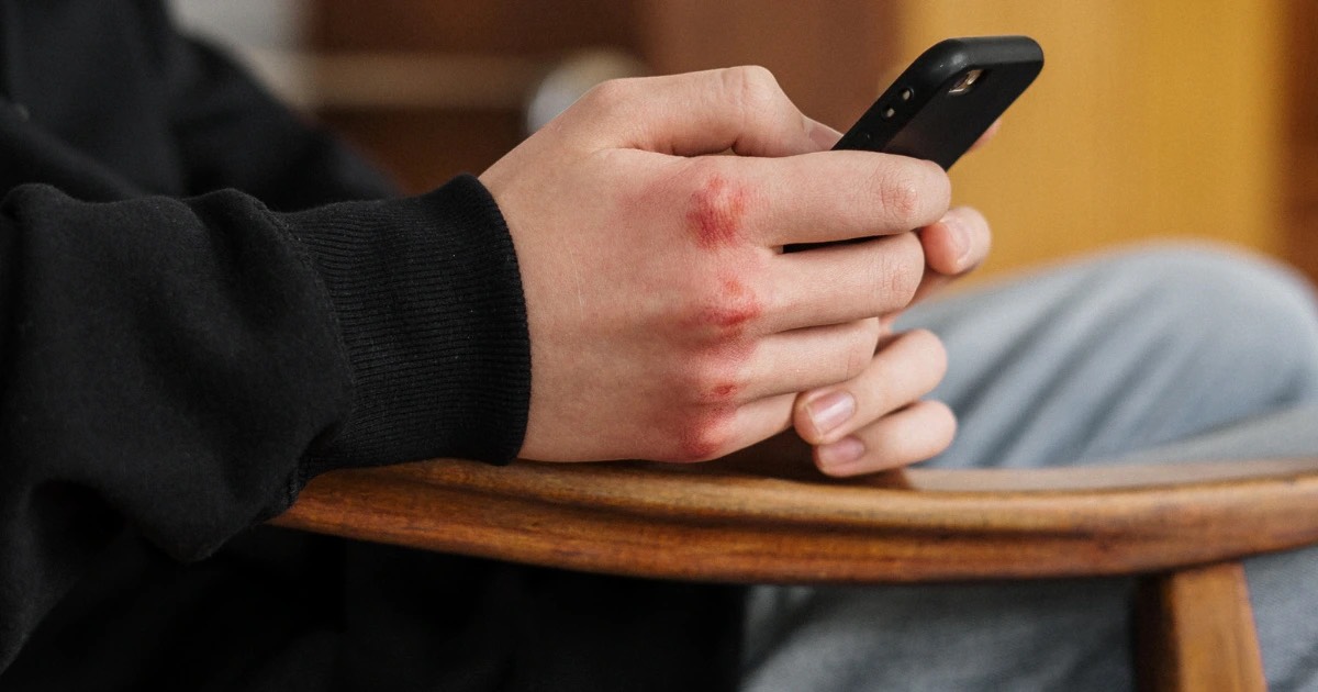 Picture showing the harmful effects of cyberbullying on teen emotions.